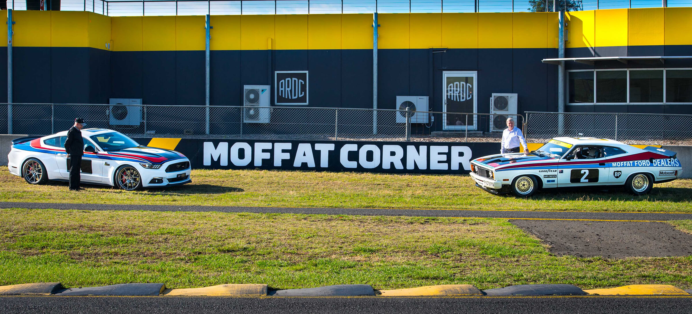 A race car turning in to Moffat Corner at speed.