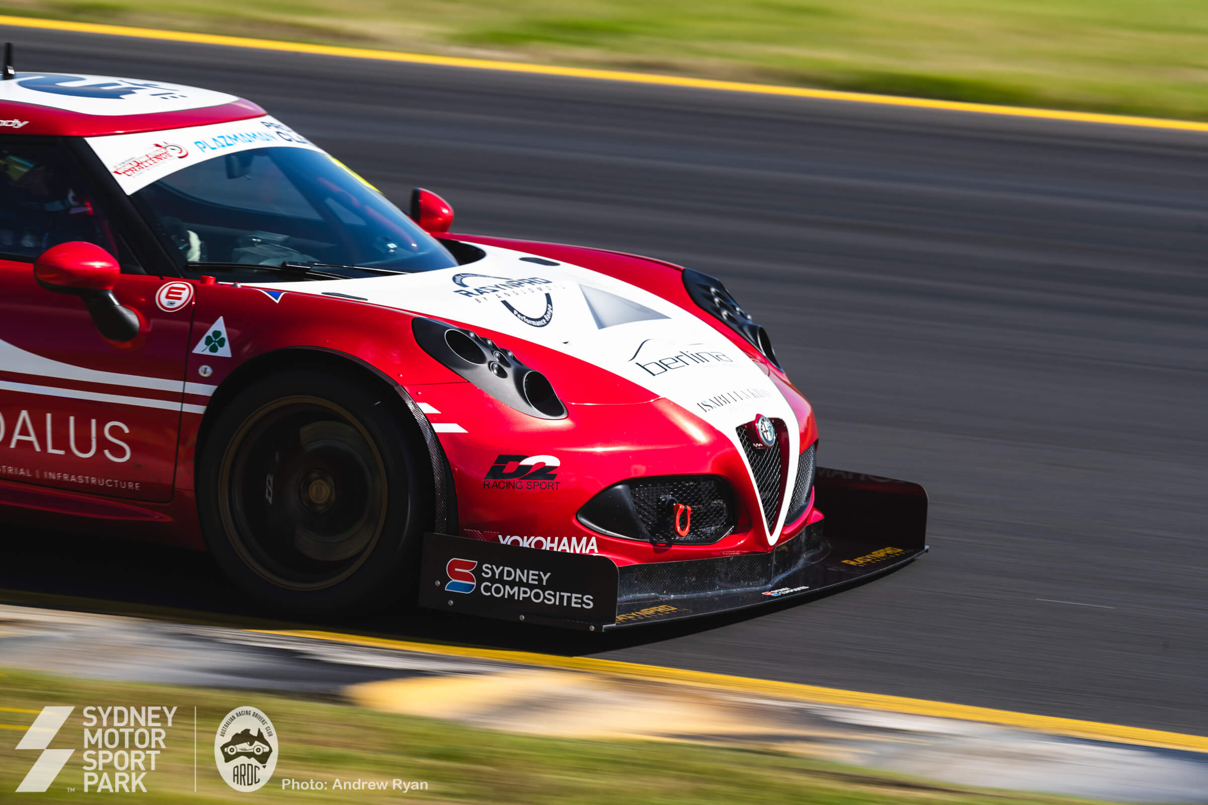 A race car flat out on the Grand Prix loop